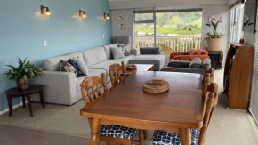 Relax and rewind at Waihi Beach with Oberon Bach